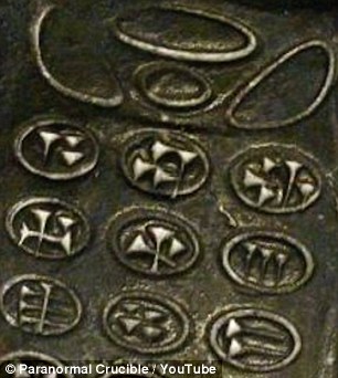 Bizarre claims that archaeologists have discovered an '800-year-old mobile phone' have sent conspiracy forums into overdrive. The object, allegedly found in Austria, is thought to be a clay model of a mobile phone with a cuneiform writing engraved on the keys