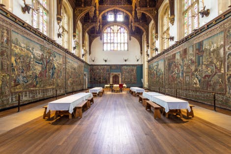 The Tudor Great Hall at Hampton Court Palace, showing the Abraham Tapestries and the room set out for day visitors.